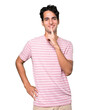 Happy young man asking for silence gesturing with his finger