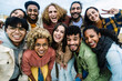 © Xavier Lorenzo - Young multiracial people having fun together outdoor - Big group portrait of happy young student friends taking photo together at city street