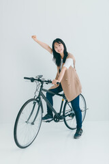 Wall Mural - 笑顔で自転車にまたがる女性　bicycle