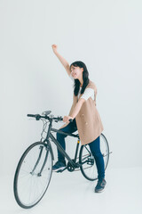 Wall Mural - 笑顔で自転車にまたがる女性　bicycle