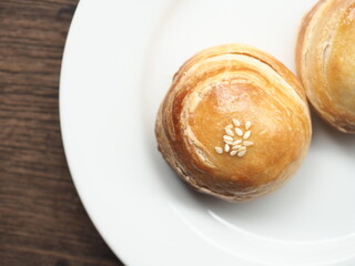 Wall Mural - Top view chinese sweet puff rolls on white plate