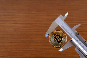 Caliber Meter with a Bitcoin Coin