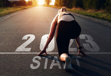 Sporty Girl Waiting To Start The New Year 2023.	
New Year 2023 With New Ambitions, Challenge, Plans, Goals And Visions.