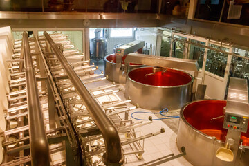 Interior of the cheese dairy factory. Equipment at cheese dairy plant