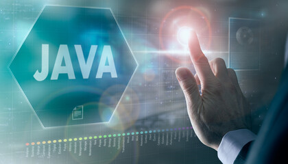 A businessman controlling a futuristic display with a Java business concept on it.