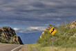 Humorous road sign along Highway 80 in New Mexico seems to show Roadway to Heaven through the Chiracahua Mountains