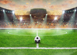 Fototapeta Sport - textured soccer game on sunny day - ball in center, midfield
