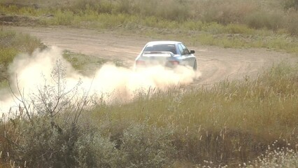 Wall Mural - Sports Car at the Turn of the Rally Track. Slow Motion