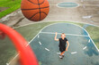© Louis-Paul Photo - portrait of a kid girl playing with a basketball in park