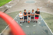 © Louis-Paul Photo - great child Team in sportswear playing basketball game