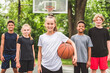 © Louis-Paul Photo - great child Team in sportswear playing basketball game