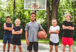 © Louis-Paul Photo - great child Team in sportswear playing basketball game