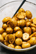 Raw Baby Yukon Gold Potatoes tossed in spices