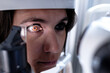 © ADDICTIVE STOCK - Woman during ocular tonometry procedure