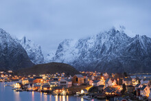 Coastal Town Near Scenic Rocky Mountains In Evening In Norway