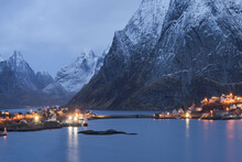 Coastal Town Near Scenic Rocky Mountains In Evening In Norway