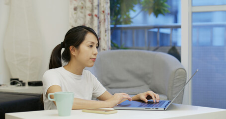 Sticker - Woman watch on laptop computer at home