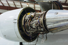 Low Angle View Of Jet Engine At Airplane Hanger
