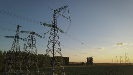 Wall Mural - Transmission tower, power tower or electricity pylon. Aerial slider footage