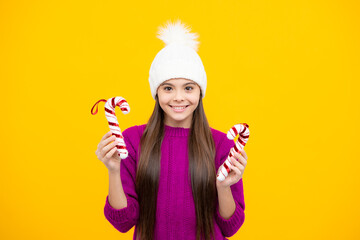 Winter hat. Cold season concept. Winter fashion accessory for children. Teen girl wearing warm knitted hat.