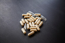 High Angle View Of Capsules On Table