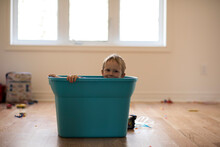 Portrait Of Boy Sitting In Tub At Home