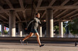 © Syda Productions - fitness, sport and healthy lifestyle concept - young man running outdoors under bridge