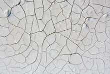 High Angle View Of Cracked Muddy Field