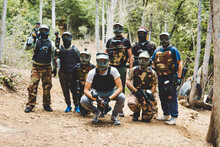 Portrait Of Army Soldiers With Weapons In Forest During Training