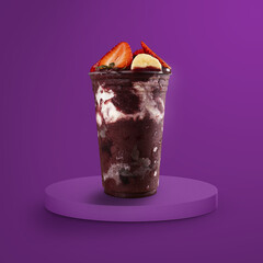 frozen acai berry cup with banana, strawberry and vegan condensed milk. on purple 3d background