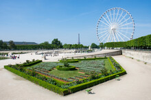 Tuileries Garden With Ferris Wheel And Eiffel Tower In Background During Sunny Day