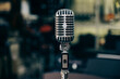 © Cavan Images - Close-up of microphone on stand in studio