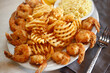 © Cavan Images - High angle view of fried food with rice served in plate on table