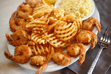 High Angle View Of Fried Food With Rice Served In Plate On Table
