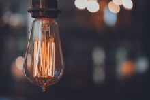 Bulb Lighting In The Night With Bokeh At The Background
