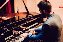 Young Musician Performing In Piano Concert