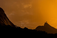 Beautiful Orange Sunset With Mountains And Christ The Redeemer