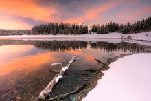 Sunrise Over Lake Palù Surrounded By Snow, Lombardy, Italy