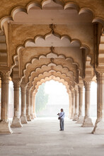 60 Years Old Tourist With Camera Visiting Agra Fort, India