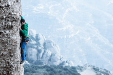 Climber Sending A Difficult Route On Sport Climbing Zone In Montserrat