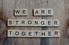 We Are Stronger Together Text On Wooden Square, Inspiration And Motivation Quotes