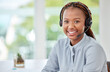 © Anela R/peopleimages.com - Portrait of a black customer support consultant, receptionist or call center agent with a headset. Happy, expert and professional woman employee working in ecommerce at a telemarketing company.