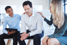 Business, Support Group And Man At The Office In Depression With Supportive Colleagues At The Workplace. Male Employee With Mental Health Problems In Divorce, Grief Or Loss With Helpful Coworkers.