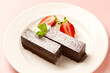 Chocolate cakes with fresh strawberries on plate, Gateau chocolat
