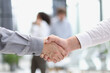 © Katsiaryna - Businessman handshake for teamwork of business merger and acquisition
