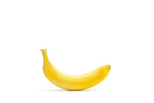 Un Plátano Sobre Un Fondo Blanco Liso Y Aislado. Vista De Frente Y De Cerca. Copy Space
