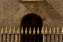 Closeup Fence Lances Facade Castle Archway Door