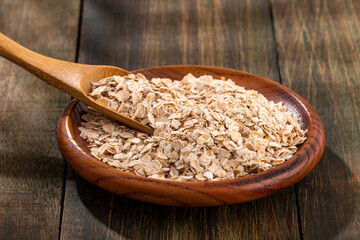 Sticker - Avena sativa - Oat flakes in the wooden bowl