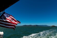 Golden Gate Bridge And Alcatraz From The Back Of A Ferry