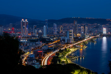 Bayrakli, Karsiyaka, Izmir, Turkey : May 2, 2022, View of Izmir Bay in the evening from the high hill of Bayrakli. Long exposure, low light.